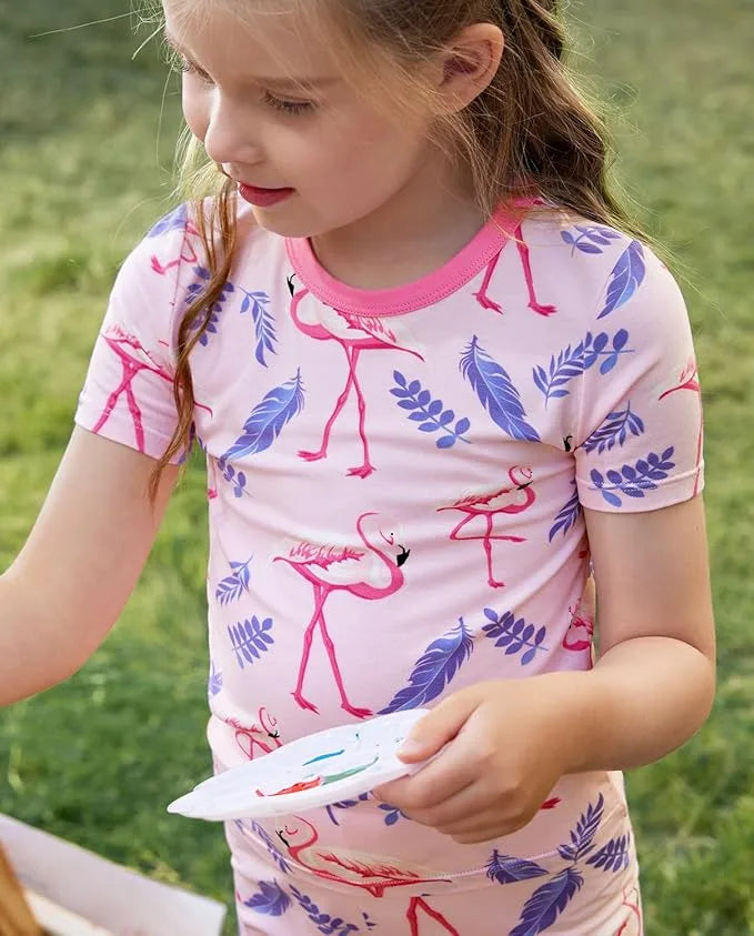 Child wearing Babee Reshinee flamingo bamboo pajamas